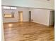 Bright, open-concept living space with updated flooring and neutral walls ready for personalization at 650 Woodridge Drive, Fern Park, FL 32730