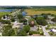 Aerial view of neighborhood, highlighting the property's location with convenient access to the lake at 7 Westchester Dr, Kissimmee, FL 34744