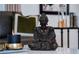 Close-up of a decorative statue on a table, enhancing the elegant ambiance of the home at 7 Westchester Dr, Kissimmee, FL 34744