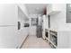 Bright laundry room with modern appliances and ample storage space at 7 Westchester Dr, Kissimmee, FL 34744