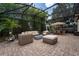 This screened patio area offers a large dining area and living space, perfect for entertaining or relaxing at 7 Westchester Dr, Kissimmee, FL 34744
