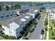 Aerial view of townhomes near a lake at 8460 Sperry St, Orlando, FL 32827