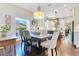 Charming dining area featuring hardwood floors and seamless access to the gourmet kitchen at 8812 S Bay Dr, Orlando, FL 32819