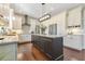 Bright kitchen featuring an island, stainless steel appliances and plenty of counter space for cooking prep at 8812 S Bay Dr, Orlando, FL 32819