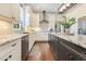 Beautiful kitchen with white cabinets, stainless steel appliances, large island, and granite countertops at 8812 S Bay Dr, Orlando, FL 32819