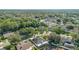 Aerial view of the neighborhood showcasing the lush landscaping and mature trees at 1013 Silcox Branch Cir, Oviedo, FL 32765