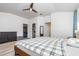 Spacious main bedroom featuring a ceiling fan, walk-in closet and en suite bathroom at 1013 Silcox Branch Cir, Oviedo, FL 32765