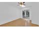 Sunlit bedroom with wood floors and sliding glass doors leading to outdoor space at 107 Wayland Cir, Longwood, FL 32779