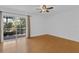Bedroom with sliding glass door leading to an outdoor space and ceiling fan at 107 Wayland Cir, Longwood, FL 32779