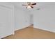 Light bedroom offers wood floors and a walk-in closet with easy access to the ensuite bathroom at 107 Wayland Cir, Longwood, FL 32779