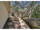 Inviting single-story home with a landscaped front yard and a cozy entrance at 107 Wayland Cir, Longwood, FL 32779