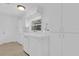 Well-lit laundry room with modern appliances and plenty of storage at 107 Wayland Cir, Longwood, FL 32779