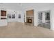Spacious living room with tile floors, a stone fireplace, and natural light at 107 Wayland Cir, Longwood, FL 32779