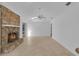 Bright living room with tile floors and a stone fireplace at 107 Wayland Cir, Longwood, FL 32779