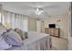 Serene main bedroom with soft lighting, neutral tones, and stylish furnishings at 112 Cordova Ave, Davenport, FL 33897