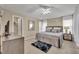 Cozy bedroom with an accent rug, modern furniture, and plenty of natural light at 112 Cordova Ave, Davenport, FL 33897