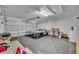 Spacious garage featuring table tennis, laundry hookups, and ample room for storage and activities at 112 Cordova Ave, Davenport, FL 33897