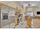 Spacious kitchen with stainless appliances, granite countertops, and lots of natural light at 112 Cordova Ave, Davenport, FL 33897