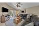 Comfortable living room with sliding glass doors and a view of the outdoor pool area at 112 Cordova Ave, Davenport, FL 33897