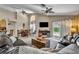 Open floor plan showcasing the living room, dining area, and access to the backyard at 112 Cordova Ave, Davenport, FL 33897