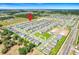 Aerial view of neighborhood with home location marker over the property at 1127 Foreshore Ln, Haines City, FL 33844