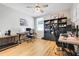 Well-appointed home office with modern desks, ample storage, and great natural light at 1127 Foreshore Ln, Haines City, FL 33844