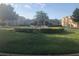 Attractive community features a lush lawn and fountain landscaping near clubhouse and residential buildings at 120 Terrace Ridge Cir # 120, Davenport, FL 33896