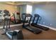 Fitness center with treadmills, elliptical and mirror at 120 Terrace Ridge Cir # 120, Davenport, FL 33896