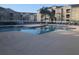 Large community swimming pool and lounge chairs at 120 Terrace Ridge Cir # 120, Davenport, FL 33896
