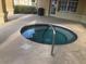 Relaxing spa with clear water, and access step at 120 Terrace Ridge Cir # 120, Davenport, FL 33896