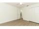 Bright bedroom features light wood flooring and a spacious closet with sliding doors at 1204 Duncan Ct, Longwood, FL 32779
