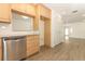 Updated kitchen with stainless steel dishwasher, and ample cabinet space at 1204 Duncan Ct, Longwood, FL 32779
