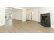 Bright living room with modern flooring, fireplace, and open layout at 1204 Duncan Ct, Longwood, FL 32779