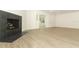 Spacious living room with fireplace and glass doors to the outdoors at 1204 Duncan Ct, Longwood, FL 32779