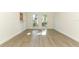 Sun-filled living room with new flooring and neutral walls at 1204 Duncan Ct, Longwood, FL 32779