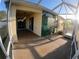 Screened in lanai with decorated exterior wall at 1221 Santa Cruz Dr, The Villages, FL 32162
