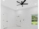 Clean entryway featuring sleek marble floors, a secure front door, and modern black hardware at 13525 Se 100Th Ave, Belleview, FL 34420