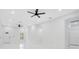 Spacious living room with recessed lighting, ceiling fans, and marble floors at 13525 Se 100Th Ave, Belleview, FL 34420