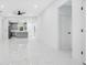 Bright, open living space featuring marble floors, modern kitchen and clean design at 13525 Se 100Th Ave, Belleview, FL 34420