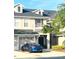 Two-story home boasting attached garage, well-manicured landscaping, and neutral color scheme in desirable community at 14033 Turning Leaf Dr, Orlando, FL 32828