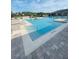 Stunning community pool featuring a zero entry and clear blue water, perfect for a refreshing swim at 14033 Turning Leaf Dr, Orlando, FL 32828