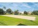 Sandy volleyball court perfect for beach volleyball games in a lush, green community setting at 14033 Turning Leaf Dr, Orlando, FL 32828