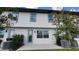 Home backyard with a patio area and well-maintained landscaping at 1429 Discovery St, Davenport, FL 33896