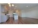 Spacious kitchen features a large island, stainless steel appliances, and ample counter space at 1429 Discovery St, Davenport, FL 33896