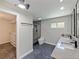 Bathroom featuring double sinks, granite countertops, walk in closet and glass enclosed shower at 208 Frinton Cv, Longwood, FL 32779