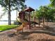 Community playground with slides and play structures near the waterfront for outdoor fun at 208 Frinton Cv, Longwood, FL 32779