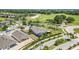A beautiful view of a residential area and a golf course, surrounded by lush trees and greenery at 2108 Antilles Club Dr, Kissimmee, FL 34747