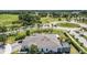 Aerial view showcasing the home's expansive lot, beautiful landscaping, and proximity to the golf course at 2108 Antilles Club Dr, Kissimmee, FL 34747