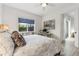 Bright bedroom with large window and door leading to the lanai at 2108 Antilles Club Dr, Kissimmee, FL 34747