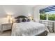 Comfortable bedroom featuring a queen bed with shiplap accent wall and elegant decor at 2108 Antilles Club Dr, Kissimmee, FL 34747